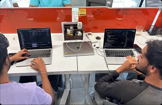 Team members coding together