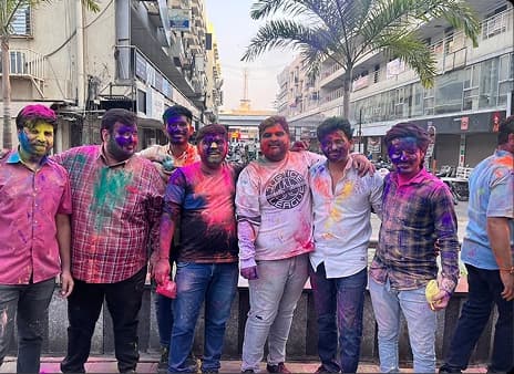 Team celebrating Holi festival